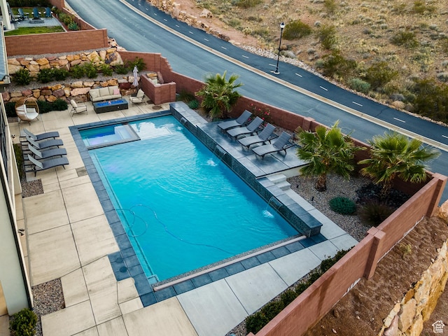 6026 S Zen Trail Way, St George, UT 84790 - view of pool with an outdoor living space, pool water feature, and a patio area