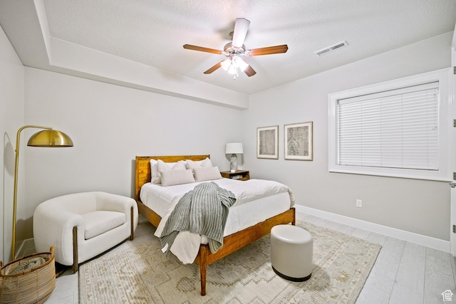 6026 S Zen Trail Way, St George, UT 84790 - bedroom with hardwood / wood-style floors and ceiling fan