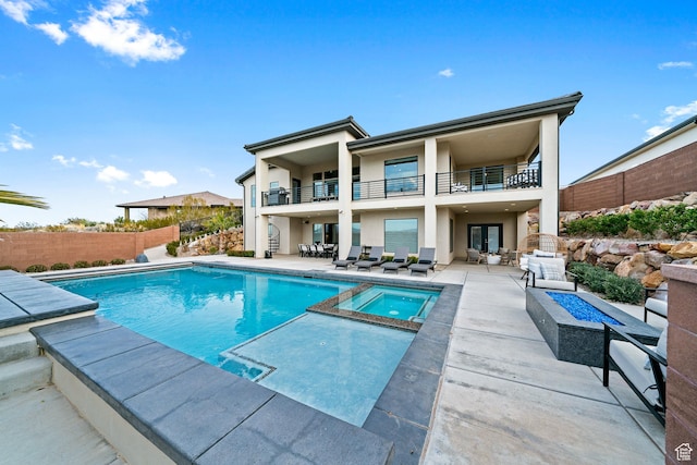 6026 S Zen Trail Way, St George, UT 84790 - view of swimming pool featuring an in ground hot tub, a patio, and a fire pit