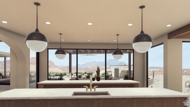 1272 N Hillside Way, Santa Clara, UT 84765 - kitchen with pendant lighting, a mountain view, sink, and an island with sink