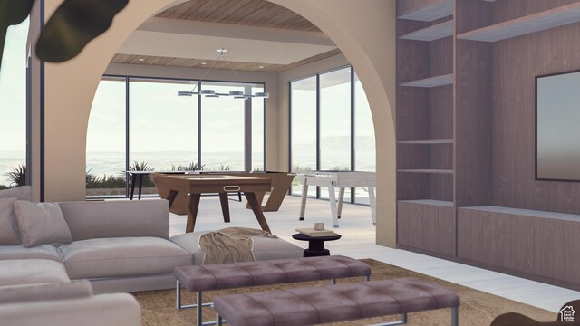 1272 N Hillside Way, Santa Clara, UT 84765 - living room featuring floor to ceiling windows, a chandelier, and built in features