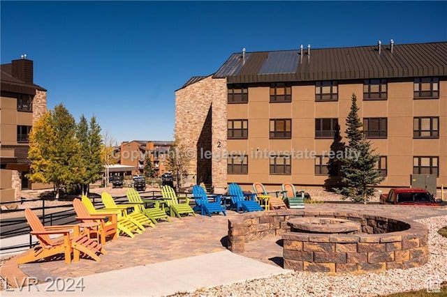 223 Hunter Ridge Rd Unit B303, Brian Head, UT 84719 - view of property featuring a fire pit