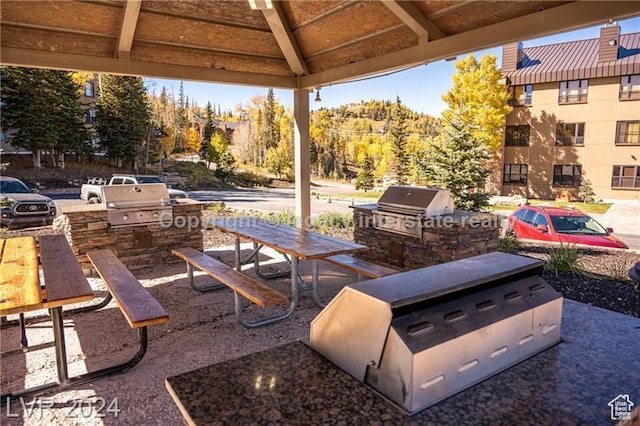 223 Hunter Ridge Rd Unit B303, Brian Head, UT 84719 - view of patio / terrace with a gazebo, an outdoor kitchen, and a grill