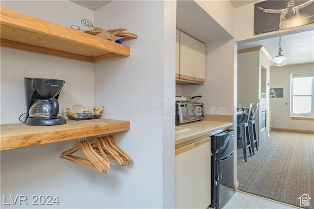 223 Hunter Ridge Rd Unit B303, Brian Head, UT 84719 - kitchen featuring light carpet