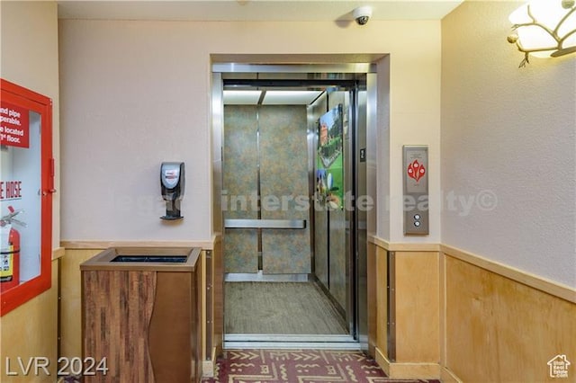 223 Hunter Ridge Rd Unit B303, Brian Head, UT 84719 - bathroom featuring wooden walls and elevator