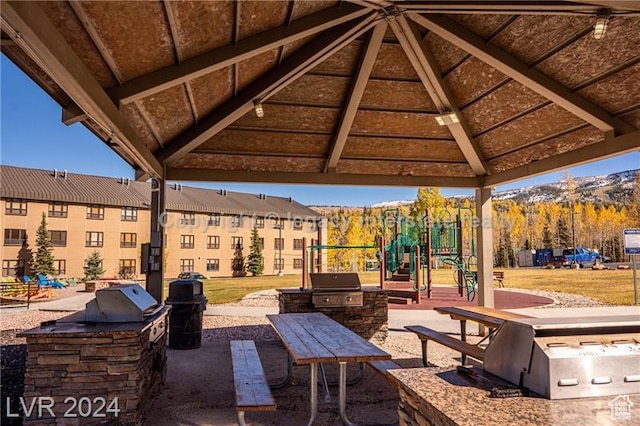 223 Hunter Ridge Rd Unit B303, Brian Head, UT 84719 - view of patio featuring a grill, a mountain view, area for grilling, and a gazebo