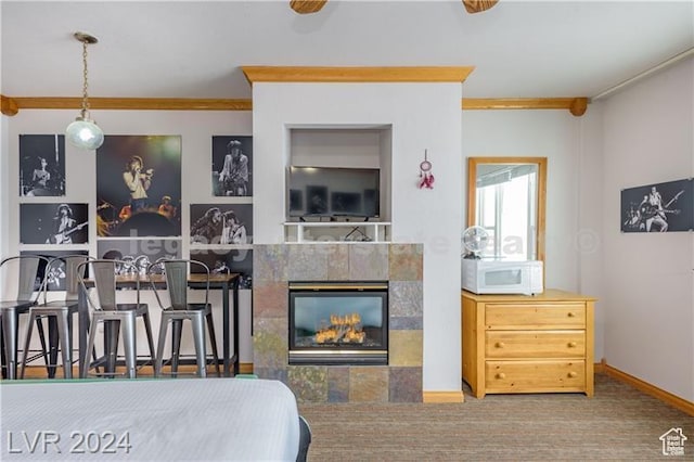 223 Hunter Ridge Rd Unit B303, Brian Head, UT 84719 - bedroom featuring a tiled fireplace and ornamental molding