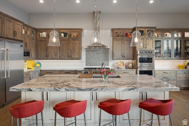 1310 Mellow Rd, Park City, UT 84060 - kitchen featuring dark wood-style flooring, tasteful backsplash, built in appliances, and recessed lighting
