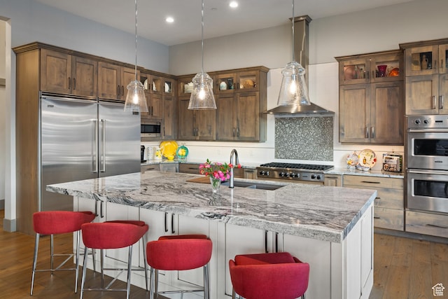 1310 Mellow Rd, Park City, UT 84060 - kitchen featuring tasteful backsplash, light stone counters, and built in appliances