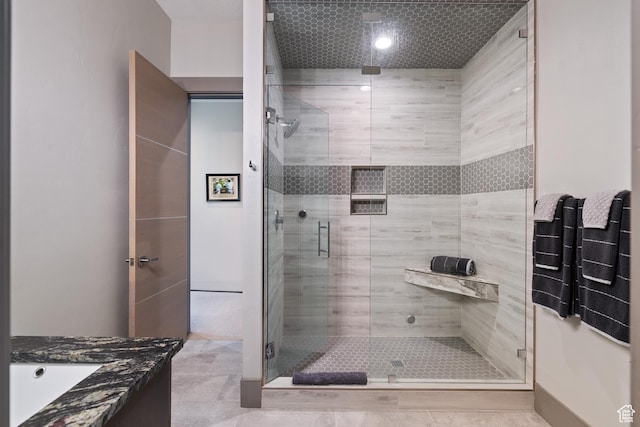 1310 Mellow Rd, Park City, UT 84060 - full bathroom with tile patterned flooring, a shower stall, and vanity
