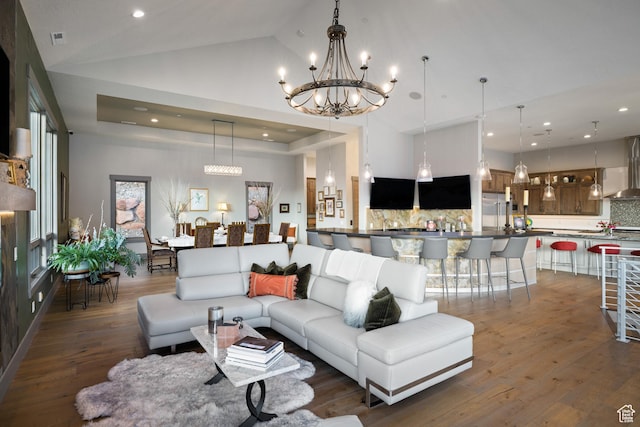 1310 Mellow Rd, Park City, UT 84060 - living area with dark wood finished floors, visible vents, recessed lighting, a chandelier, and lofted ceiling