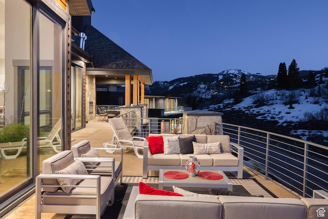 1310 Mellow Rd, Park City, UT 84060 - snow covered back of property with a mountain view and an outdoor living space