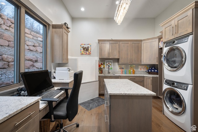 1310 Mellow Rd, Park City, UT 84060 - laundry room with dark wood-type flooring, laundry area, stacked washer and dryer, and recessed lighting