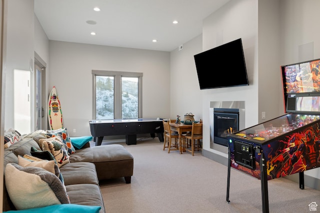 1310 Mellow Rd, Park City, UT 84060 - recreation room with recessed lighting, carpet flooring, and a glass covered fireplace