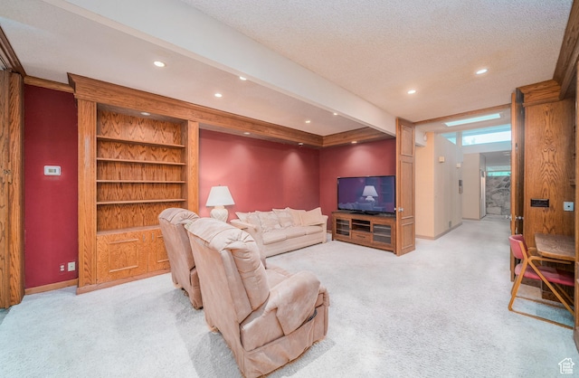 975 N 1600 E, Logan, UT 84321 - living area featuring a textured ceiling, baseboards, light colored carpet, beamed ceiling, and recessed lighting