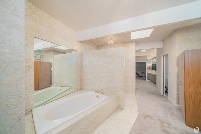 975 N 1600 E, Logan, UT 84321 - ensuite bathroom featuring a skylight, ensuite bathroom, and a garden tub