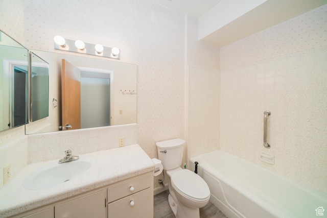 975 N 1600 E, Logan, UT 84321 - bathroom with toilet, vanity, and wallpapered walls
