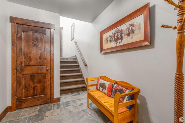 14160 N Council Fire Trl, Heber City, UT 84032 - stairway with baseboards and stone finish flooring