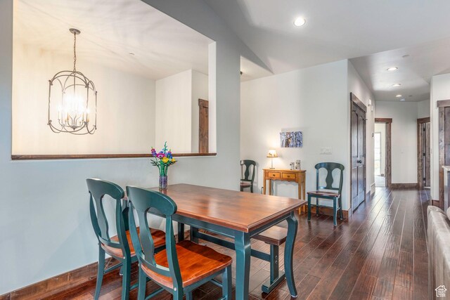 14160 N Council Fire Trl, Heber City, UT 84032 - dining area with dark wood-style flooring, a chandelier, baseboards, and recessed lighting