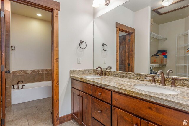14160 N Council Fire Trl, Heber City, UT 84032 - bathroom featuring double vanity, a garden tub, and tile patterned floors
