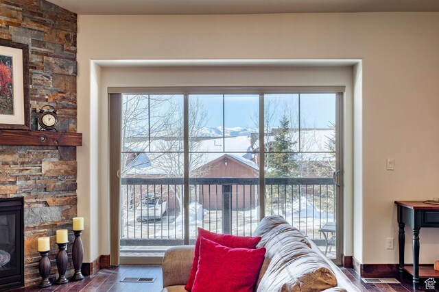 14160 N Council Fire Trl, Heber City, UT 84032 - living area with wood finished floors, a fireplace, and baseboards
