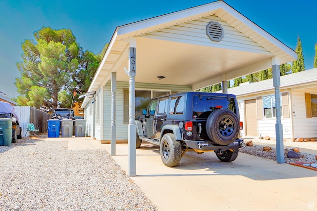 exterior space with a carport