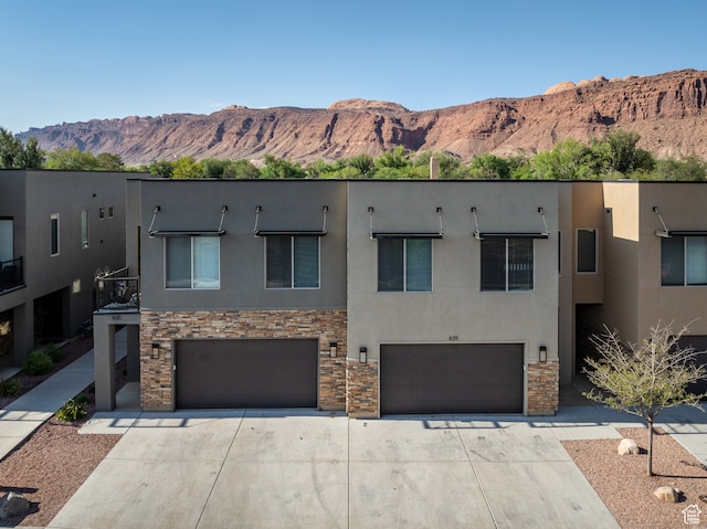 635 W 0470 N, Moab, UT 84532 - view of front of house featuring a mountain view and a garage