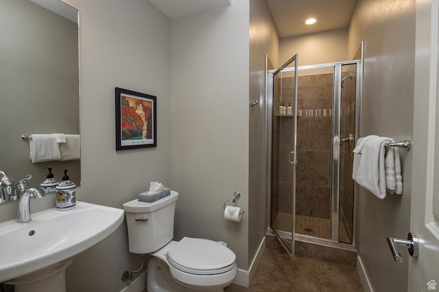 635 W 0470 N, Moab, UT 84532 - bathroom with sink, toilet, walk in shower, and tile patterned flooring