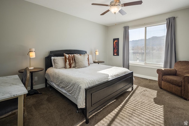 635 W 0470 N, Moab, UT 84532 - bedroom with ceiling fan and dark colored carpet