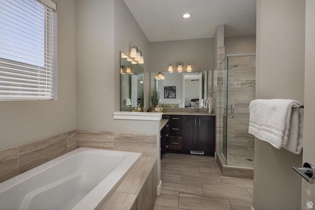 635 W 0470 N, Moab, UT 84532 - bathroom featuring plenty of natural light, vanity, and plus walk in shower