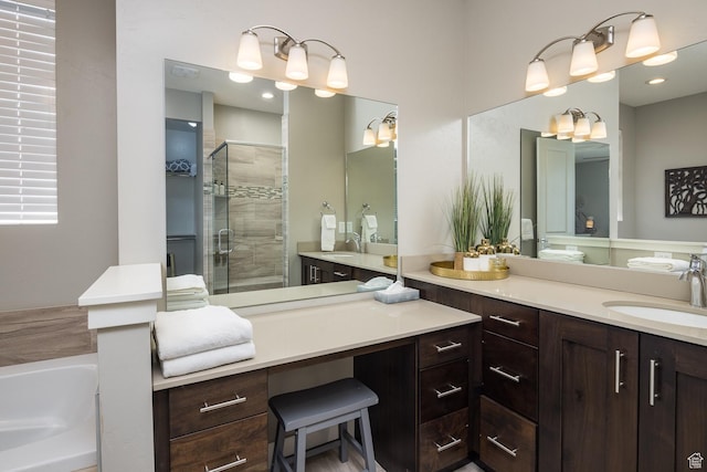 635 W 0470 N, Moab, UT 84532 - bathroom featuring shower with separate bathtub and vanity