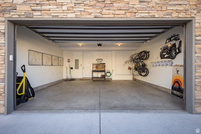 631 W 470 N, Moab, UT 84532 - garage featuring a garage door opener and electric panel