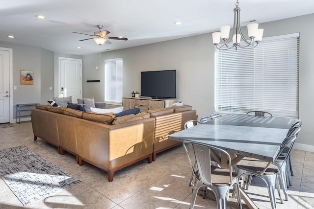 631 W 470 N, Moab, UT 84532 - tiled living room featuring ceiling fan with notable chandelier