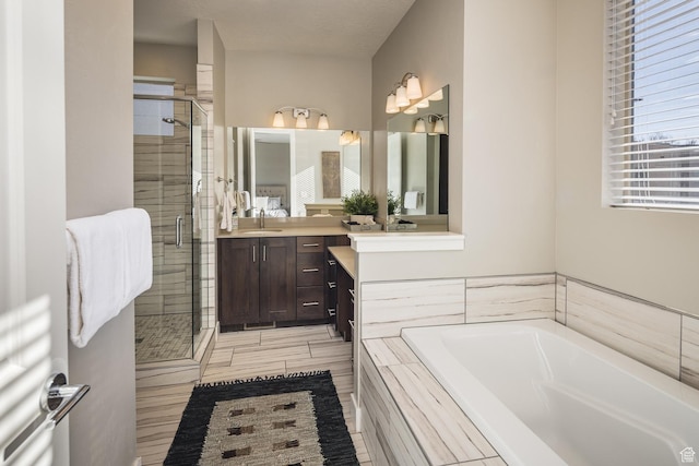 631 W 470 N, Moab, UT 84532 - bathroom featuring separate shower and tub and vanity