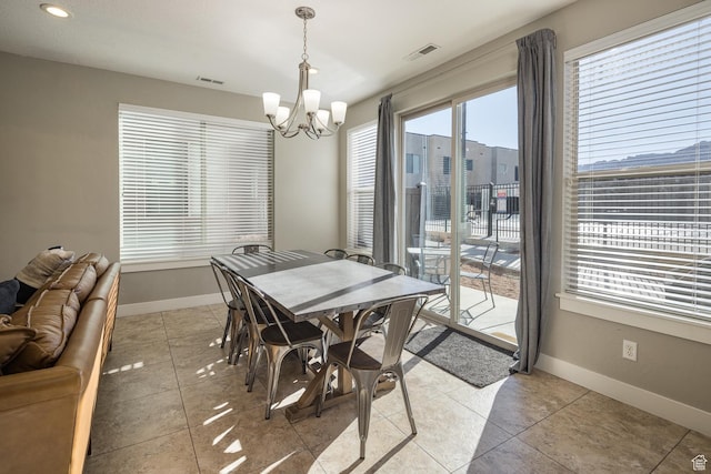 631 W 470 N, Moab, UT 84532 - dining space featuring light tile patterned floors and a notable chandelier