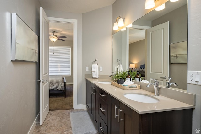631 W 470 N, Moab, UT 84532 - bathroom featuring ceiling fan, vanity, and tile patterned flooring