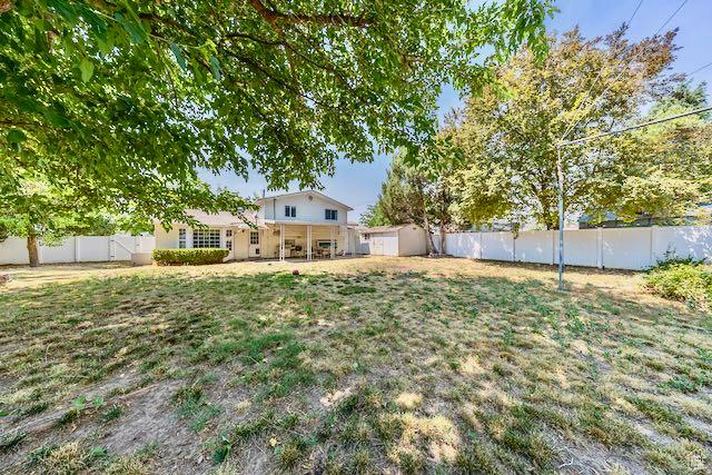 1591 N Marilyn Dr, Syracuse, UT 84075 - view of yard with a fenced backyard