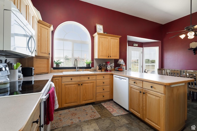 2546 W 1200 N, Roosevelt, UT 84066 - kitchen with ceiling fan, white appliances, kitchen peninsula, and sink