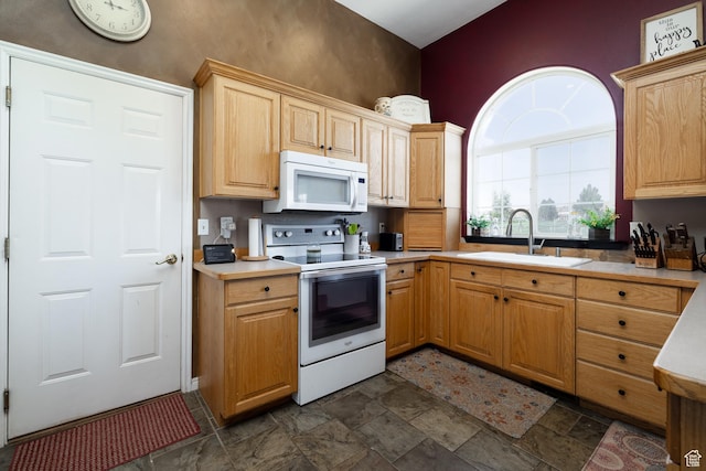 2546 W 1200 N, Roosevelt, UT 84066 - kitchen with white appliances, light brown cabinetry, and sink