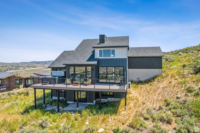 6387 Silver Sage Dr, Park City, UT 84098 - rear view of house featuring a wooden deck and a patio