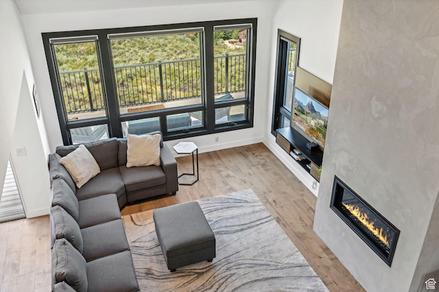 6387 Silver Sage Dr, Park City, UT 84098 - living room with a healthy amount of sunlight and light hardwood / wood-style floors