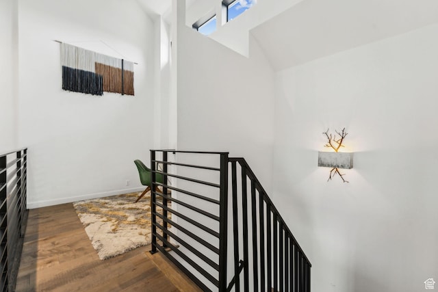 6387 Silver Sage Dr, Park City, UT 84098 - staircase with vaulted ceiling and hardwood / wood-style floors