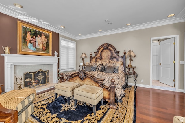 327 N 1430 E, Logan, UT 84321 - bedroom featuring a fireplace, crown molding, and hardwood / wood-style floors