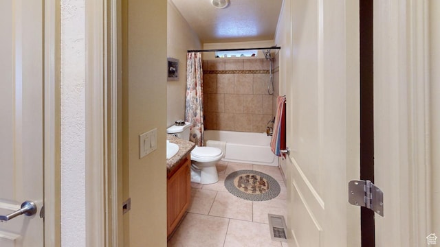 990 S Freedom Way, Big Water, UT 84741 - full bathroom with vanity, shower / tub combo, tile patterned floors, and toilet