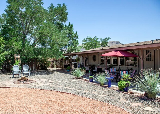 990 S Freedom Way, Big Water, UT 84741 - rear view of house featuring a patio