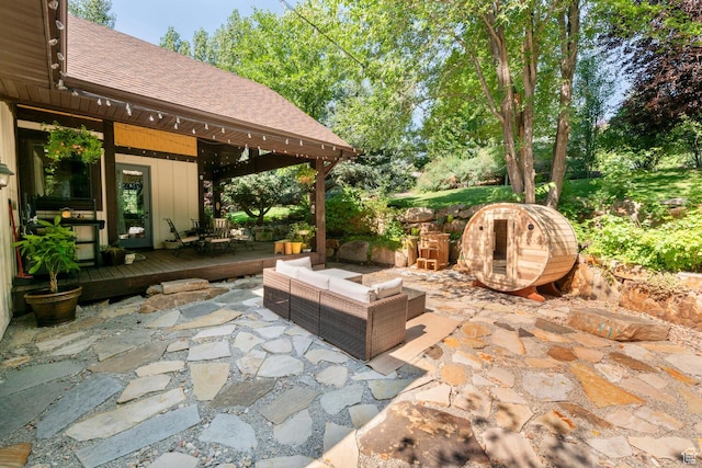 view of patio / terrace with an outdoor living space and a deck