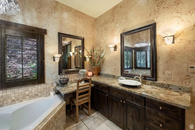 full bath featuring vanity and a bath