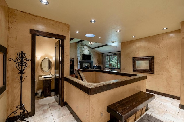 interior space featuring a stone fireplace