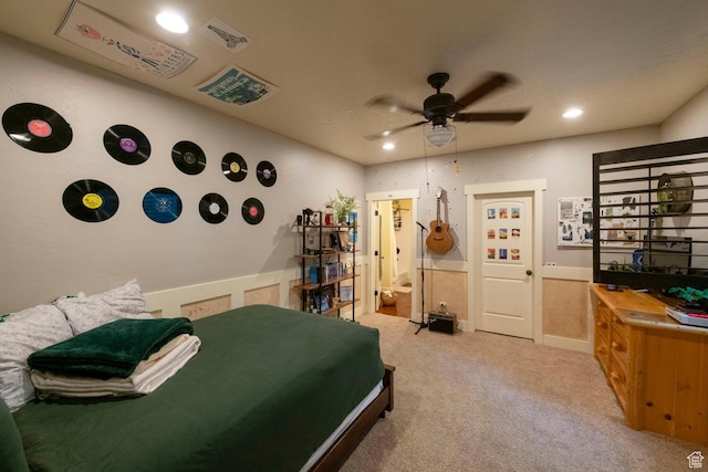 carpeted bedroom with ceiling fan and recessed lighting
