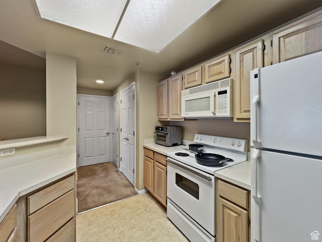 900 Bitner Rd Unit M12, Park City, UT 84098 - kitchen featuring white appliances, light brown cabinets, light countertops, and recessed lighting